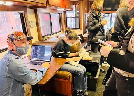 Crew spending time in the RV during Con Edison photoshoot in New York City with photographer Emily Andrews and Producer Bryan Sheffield.