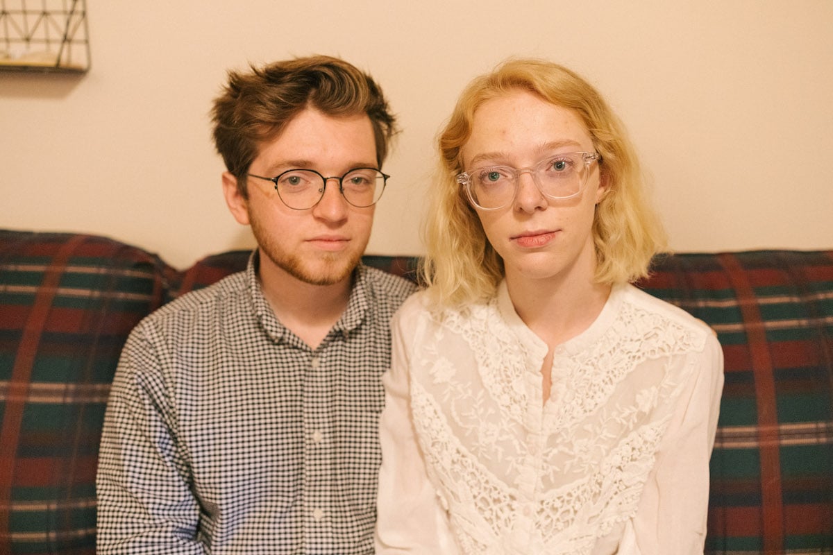 Keeley Bahn, 24, sits for a portrait with her husband, Kael
