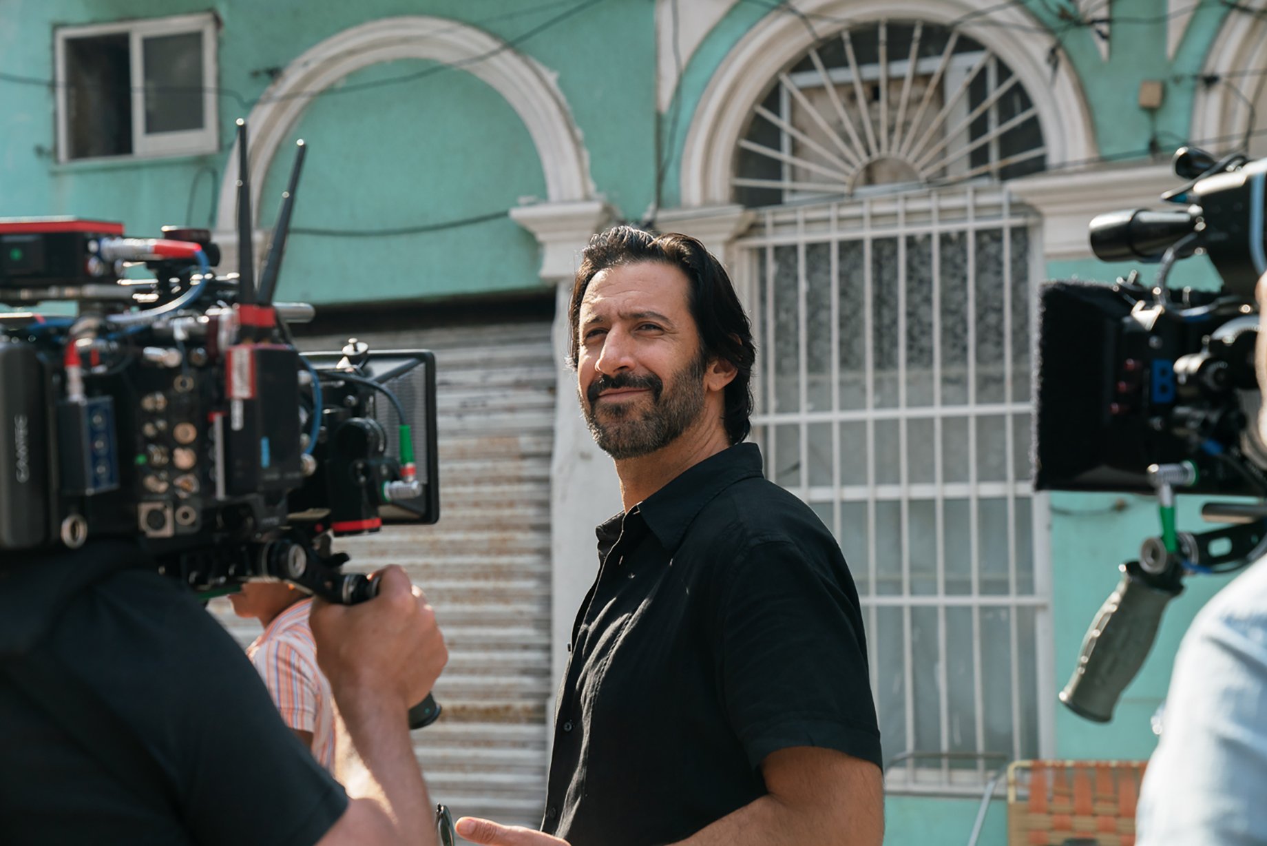 Behind-the-scenes photo of José María Yazpik who plays Amado Carillo Fuentes in Narcos: Mexico season 3 shot by Nicole Franco for Netflix