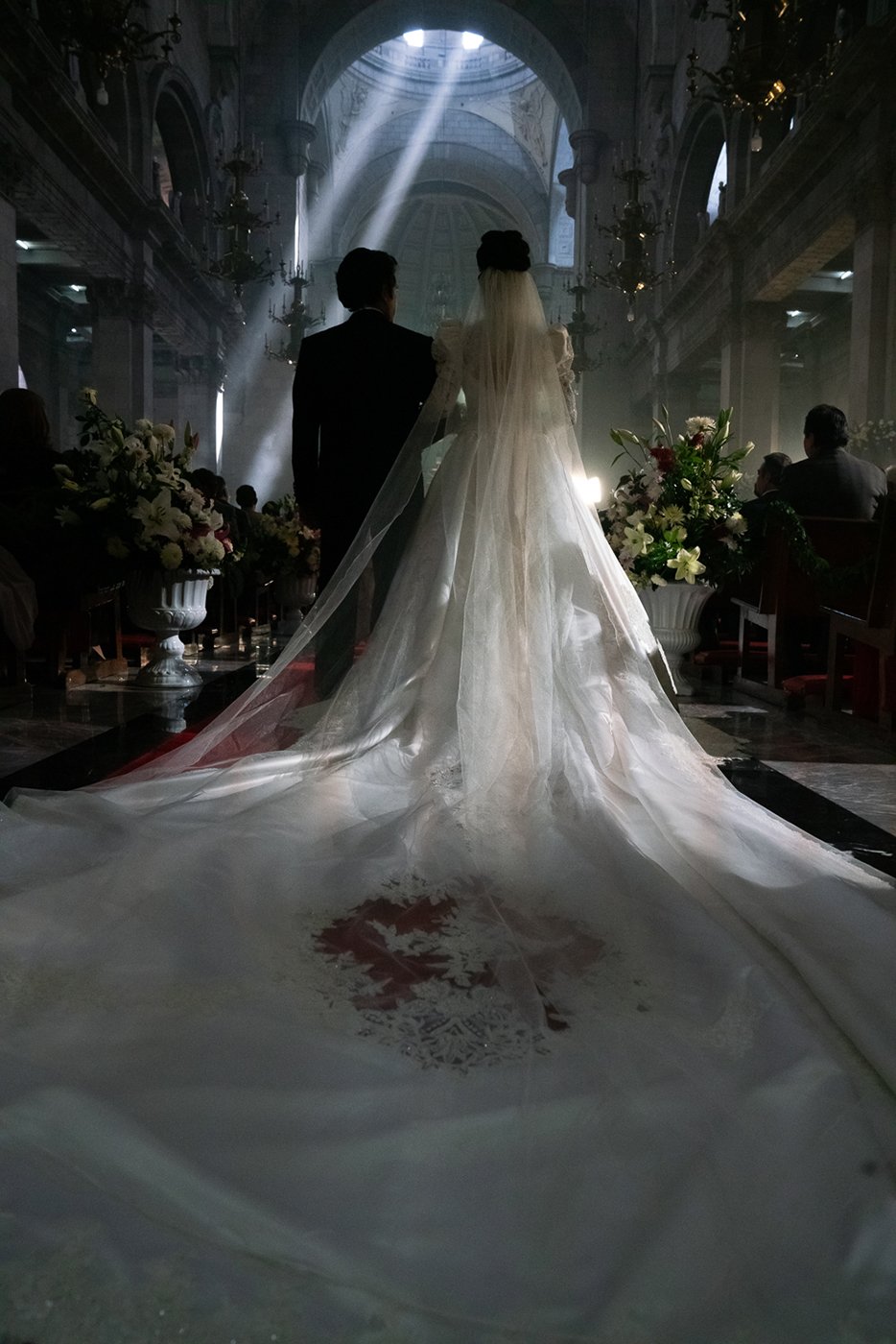 Couple walks down the aisle in Narcos: Mexico season 3 shot by Nicole Franco for Netflix