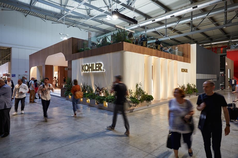Long exposure image of people walking by Kohler's exhibit during Milan Design Week 2022.