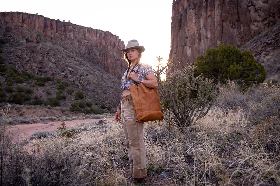 Woman in Santa Fe wearing Ramblin Rose Hat shot by Brandon Soder.