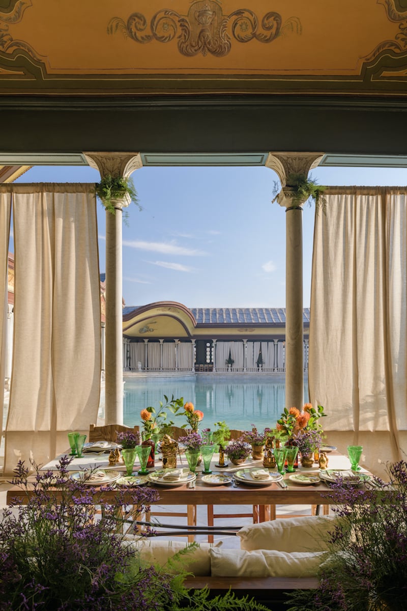 An image of the Palace of Muhammad Ali poolside with Dior table setting.