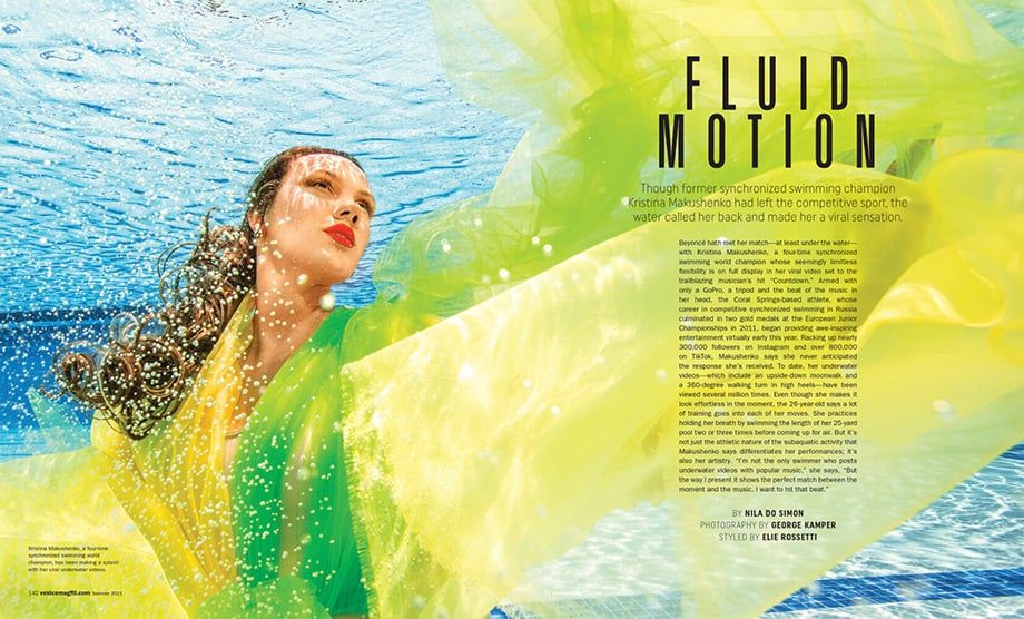 An underwater photograph of a model in bright red lipstick shot by George Kamper for Venice Magazine