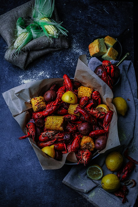 Shrimp and corn dark shot by Miami food photographer Libby Volgyes