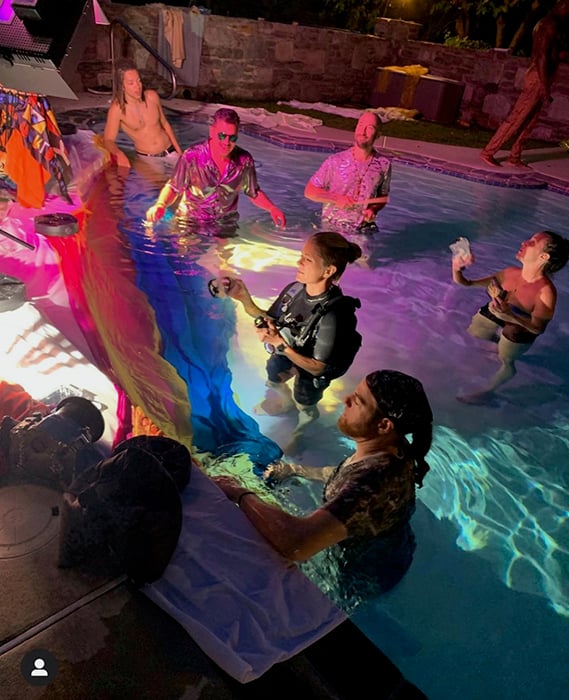 Julia Lehman-McTigue in a pool behind the scenes during underwater shoot for WorldTown