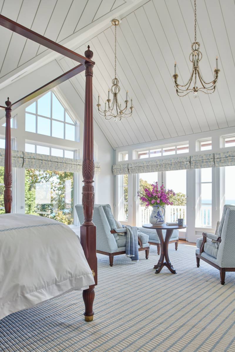 Photo by Joseph Keller of a bright, spacious bedroom with high ceilings.