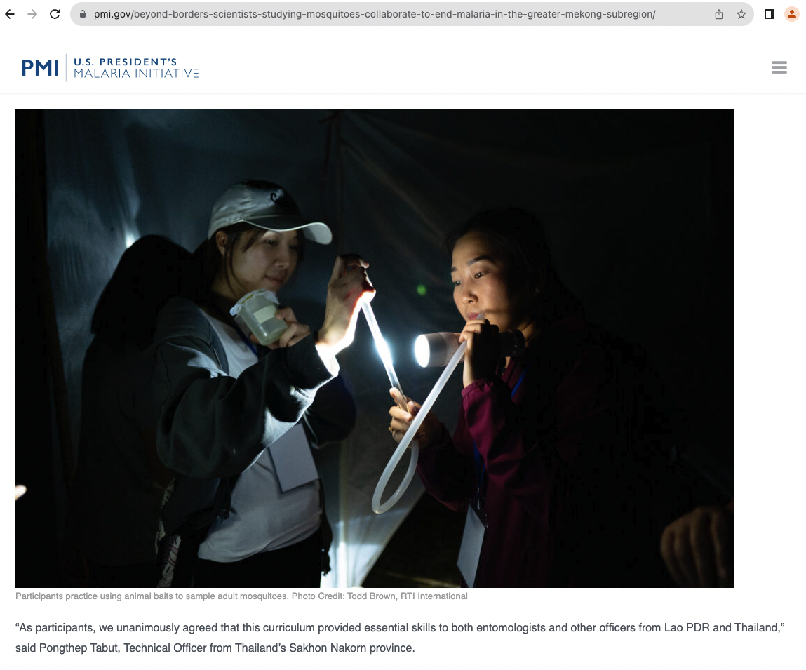 Screenshot of the PMI website featuring photo by Todd Brown of researchers studying specimens at night.