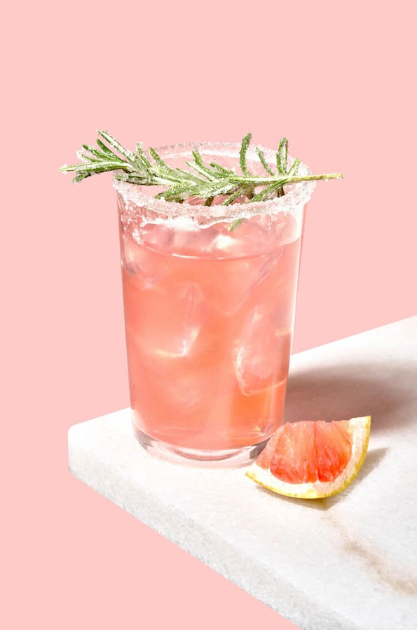 A pink grapefruit mojito garnished with sugared rosemary by photographer Suzanne Clements of Palm Bay, Florida. 