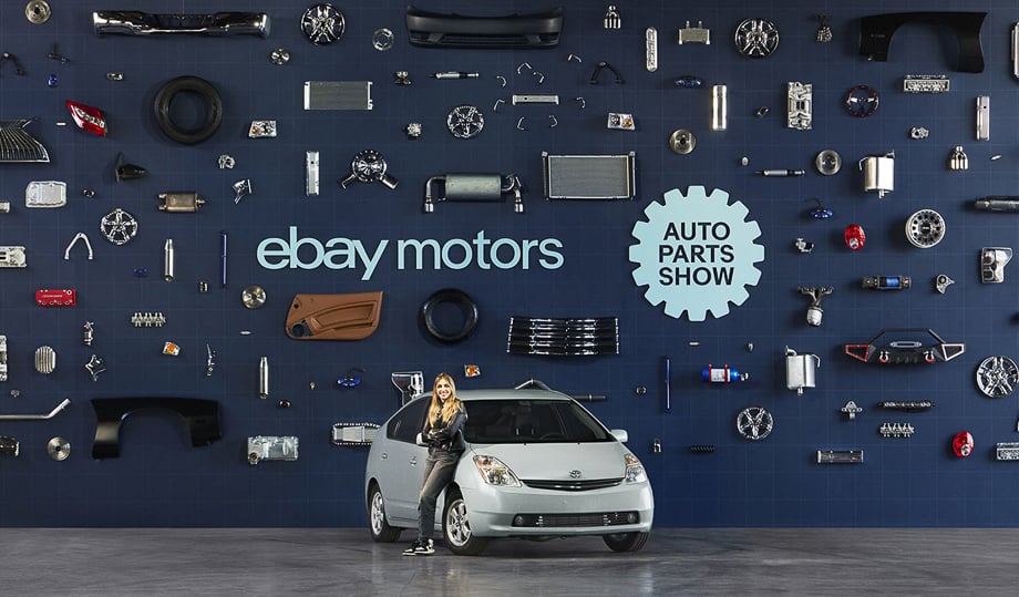Emelia Hartford with her revamped Prius Hybrid at the New York Auto Parts show. 