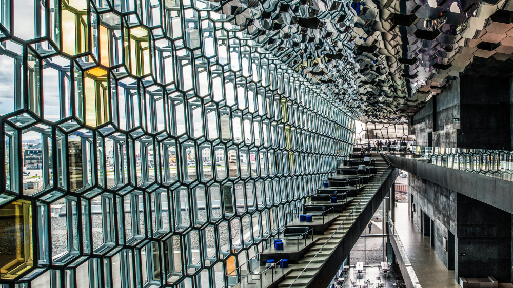 A color photograph by Anotonio Saba of the interior facade of the Harpa Concert Hal and Conference Center in Reykjavik, Iceland.