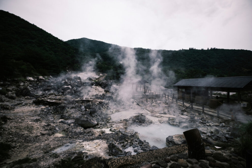 An image showing Unzen Jigoku — 'Unzen hell'— natural sulphur springs in Nagasaki Prefecture, photo by Ben Weller.