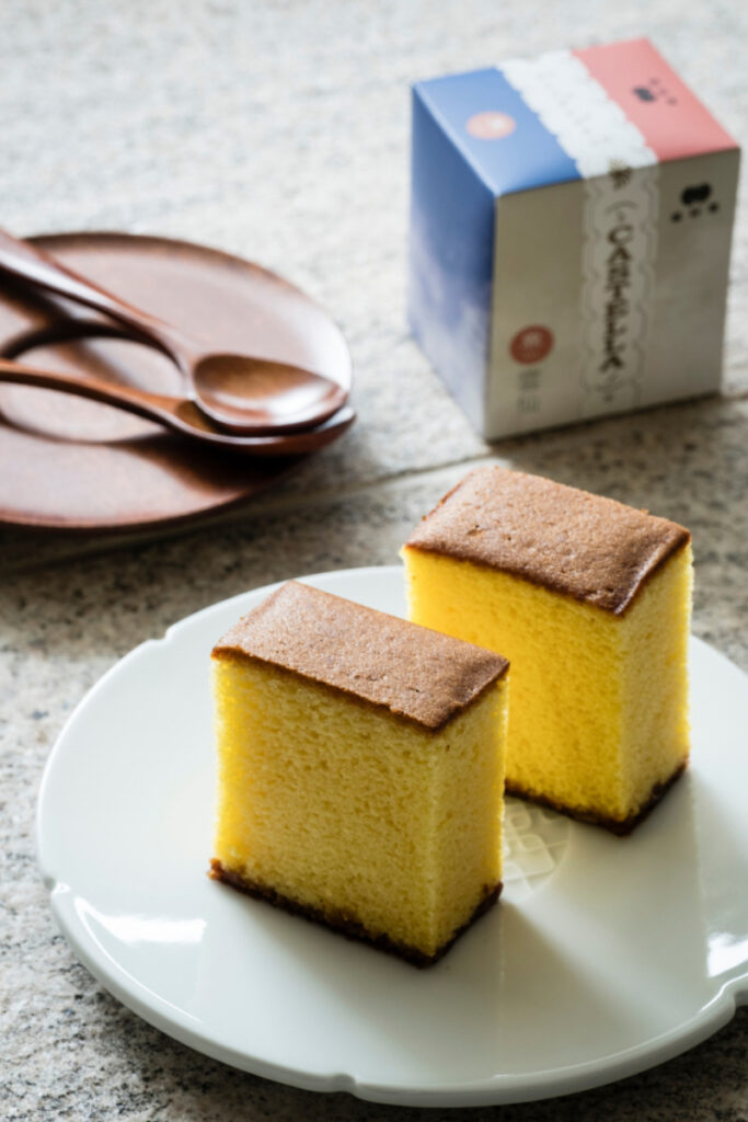 An image of a delectable sponge cake, a delightful treat from the Nagasaki Sugar Road, a scenic route spanning 141 miles from Nagasaki to Kitakyushu on Kyushu island. 