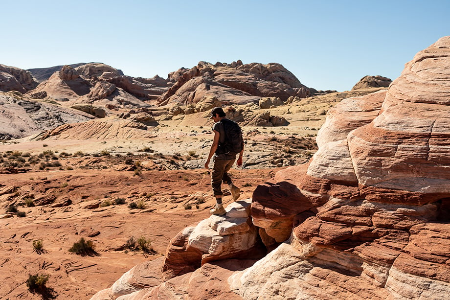 Man hiking at The Valley of Fire State Park for Erem footwear shot by Cameron Karsten. 
