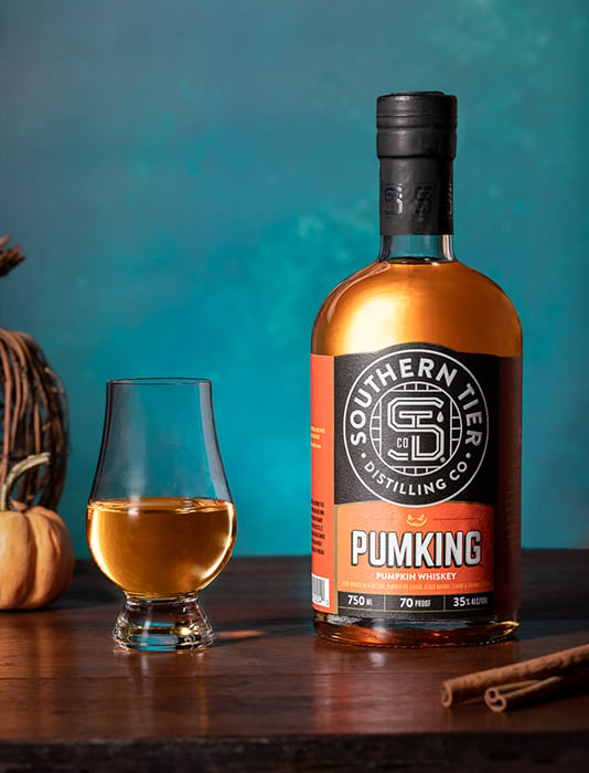 Southern Tier Brewing Company's Pumking Whiskey against a light blue backdrop