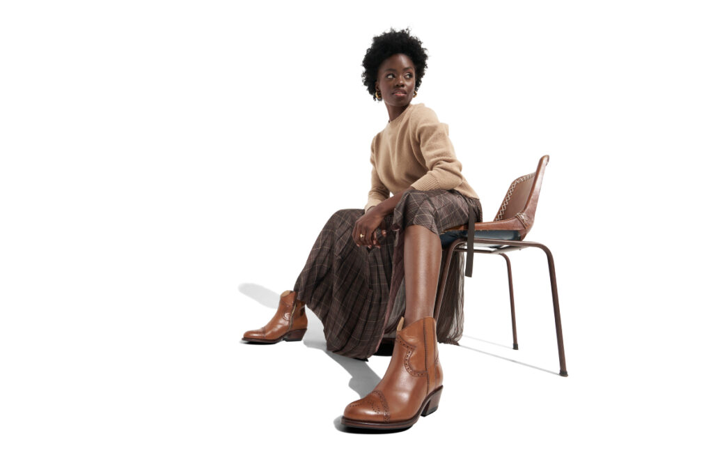 A model wearing The Office of Angela Scott shoes, photo by Chris Ossenfort.