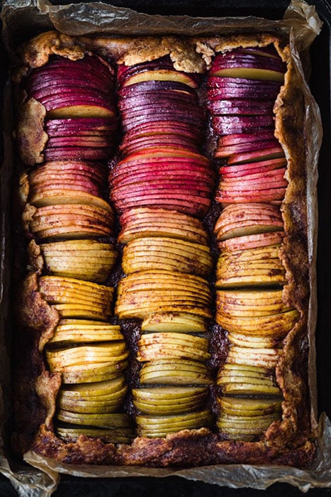 Photo of purple-shaded vegetables in a baking tray taken by Los Angeles-based food photographer Daniela Gerson. 