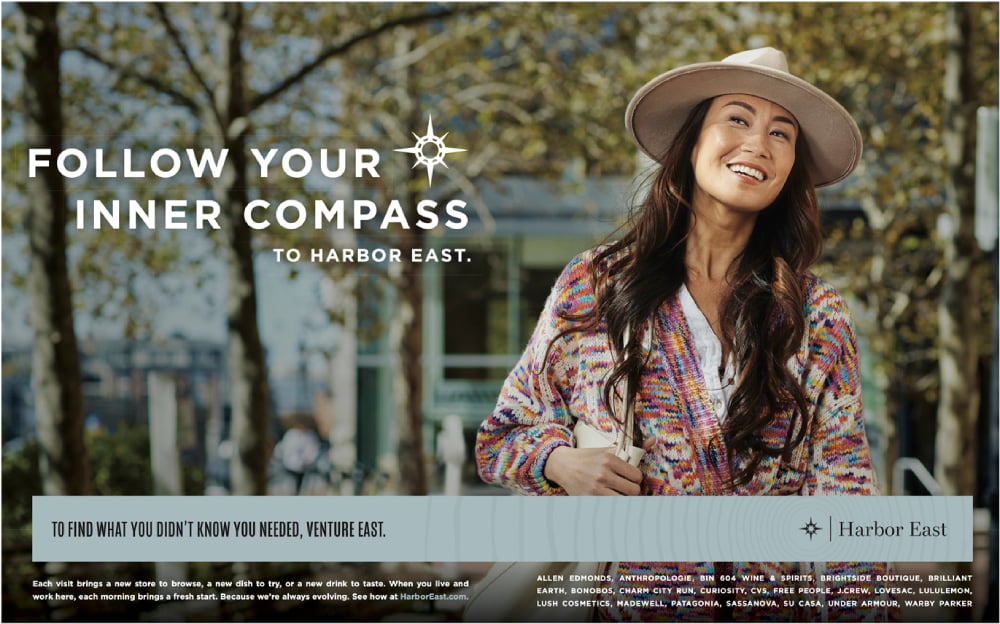 Tearsheet of a Harbor East promo campaign featuring an Asian American woman on the promenade, a photo taken by Eli Meir Kaplan. 