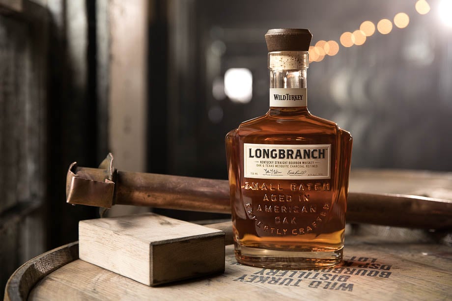 Photo of a Wild Turkey Longbranch Bourbon Whiskey bottle taken by Atlanta-based product photographer Fernando Decillis.