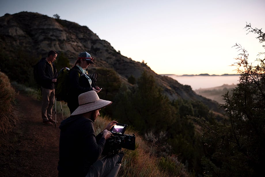 BTS - The team got up at 2am to be ready for sunrise in the Sully Creek State Park. Chris Bone readies the camera while producer Erin Kasari checks in with talent.