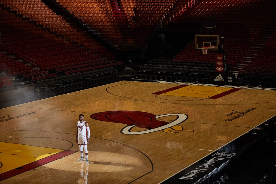 Photo of Dwyane Wade from a distance on the Miami Heat basketball court alone taken by Miami-based sports photographer Jeffery Salter. 