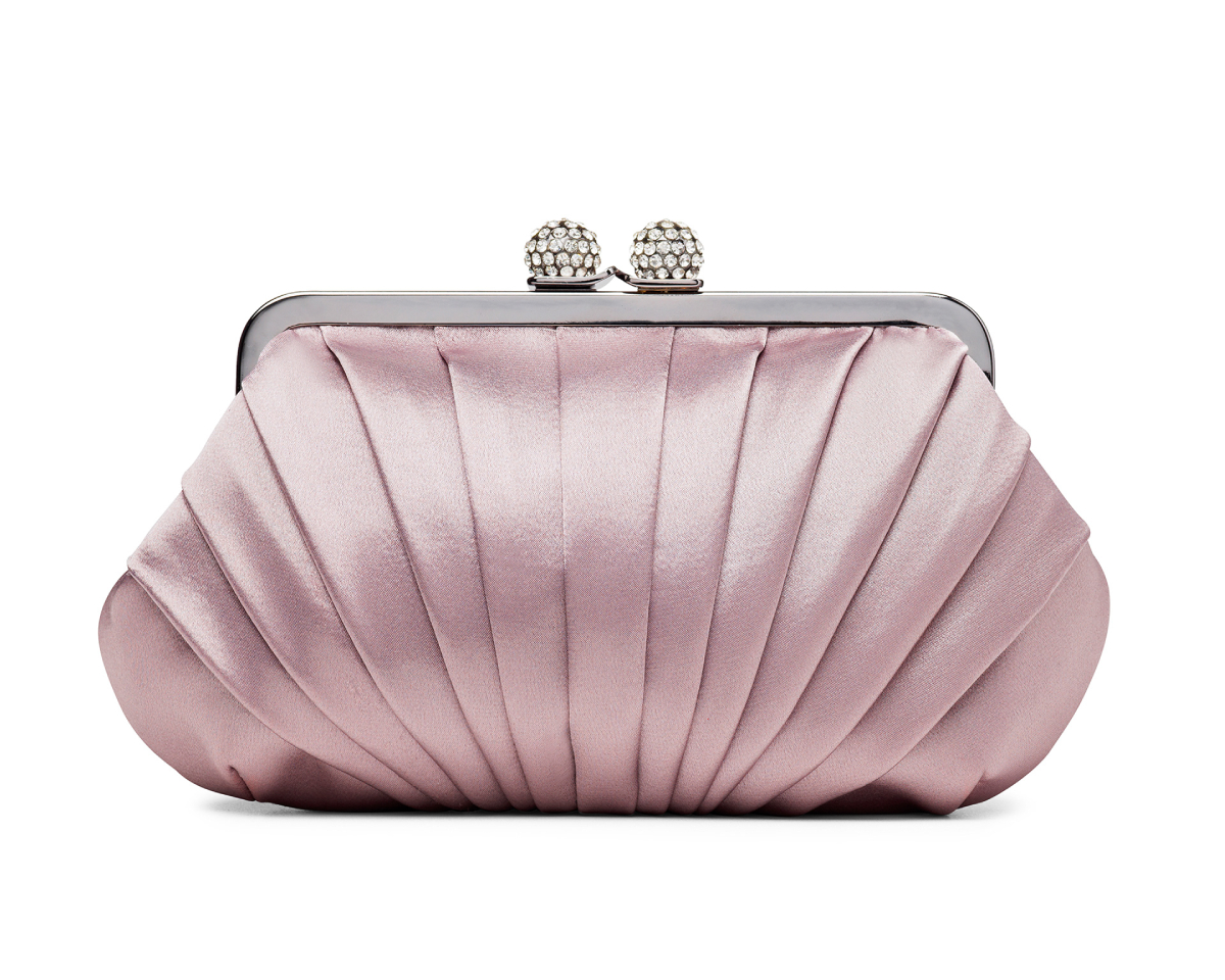 A luxurious pearl rose satin clutch bag takes center stage against a pristine white backdrop, photo by Lim Hee Peng.