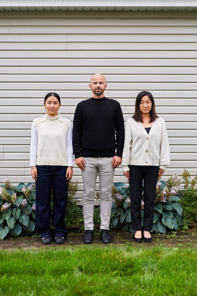 An photo of Keiko, Kana, and a man by Michael Abril.