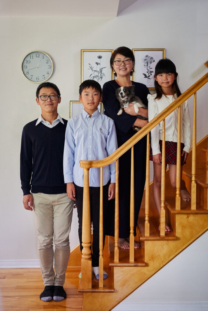 A photo of either Keiko or Kana with her family.