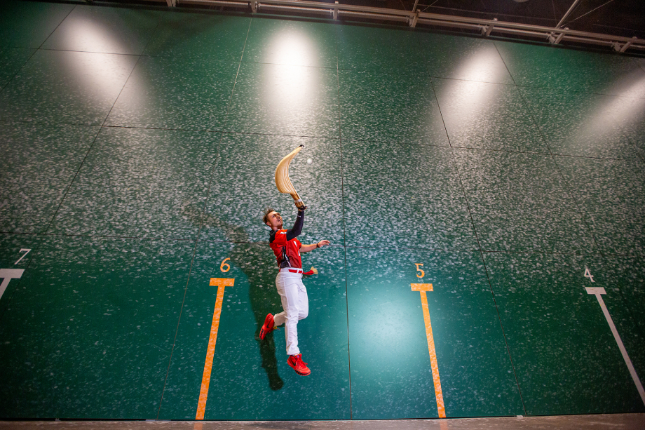 Conceptual photo of a baseball player jumping to catch the ball taken by Miami-based sports photographer Michelle VanTine. 