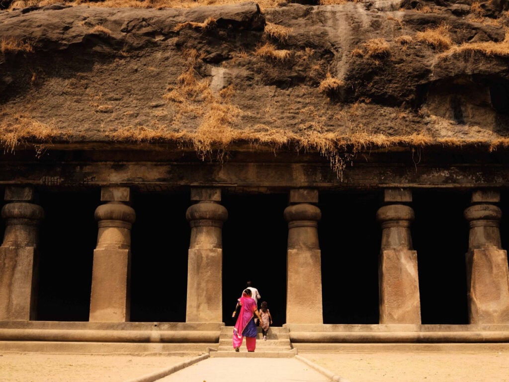 A color photo of people walking into a temple by Alvin Ng, as part of the Client Introductions service.