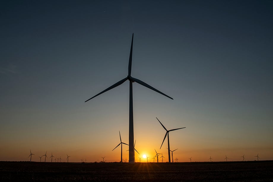 Windmills against the backdrop of a sunset in Wichita, Kansas shot by Sean F. Boggs for BP
