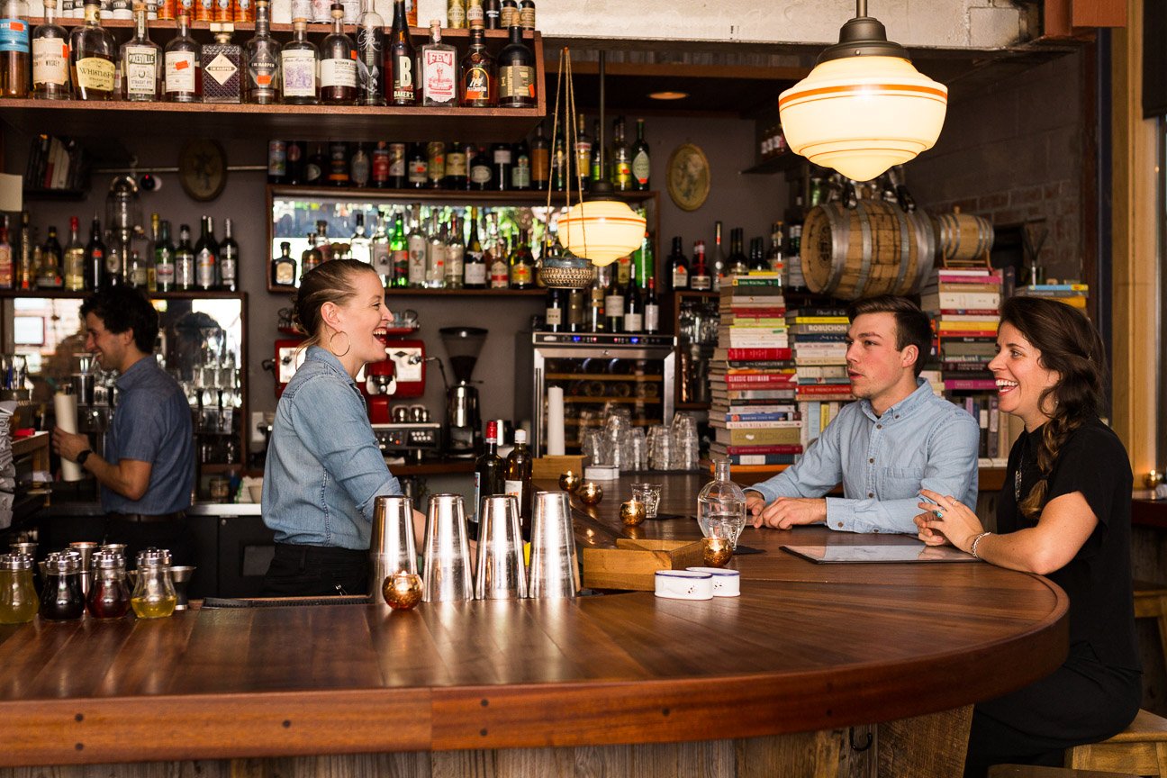 Cameron Reynolds photographs a local bar in Asheville for Southern Living Magazine.